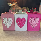 Pink and white leaf-pattern pots